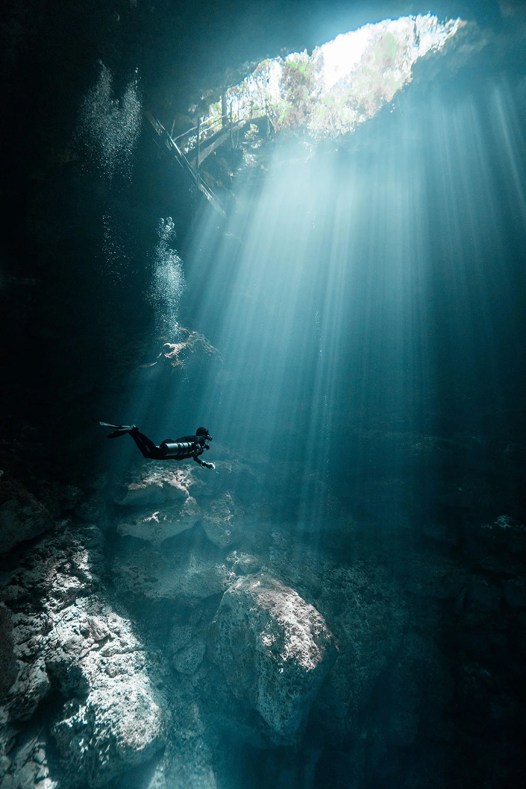 Diver descending in Cenote El Pit Playa del Carmen